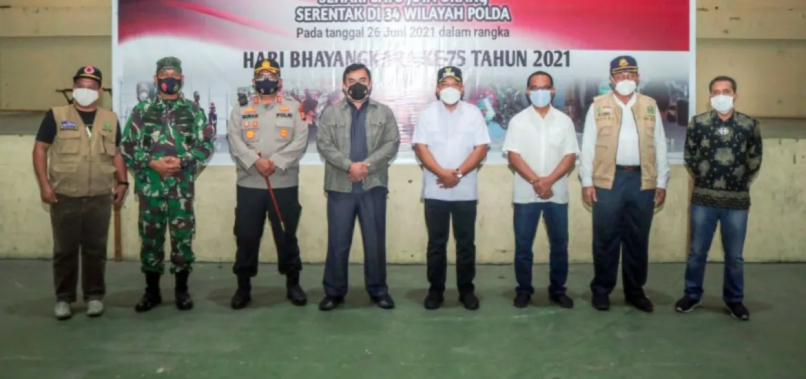Vaksinasi Massal Dalam Rangka HUT Bhayangkara Digelar di Tualang, Ini Kata Wabup Husni Merza
