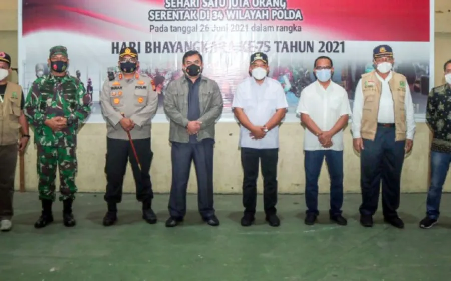 Vaksinasi Massal Dalam Rangka HUT Bhayangkara Digelar di Tualang, Ini Kata Wabup Husni Merza